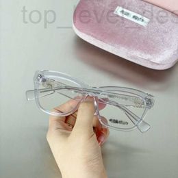 Sunglasses designer Mujia 2024 new Instagram style cat eye large frame glasses with anti blue light, plain face, sweet eyeglass can be matched myopia 3JW0