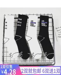 1 pair of INS South Korea Harajuku style simple letter tide brand pure cotton medium tube socks for men and women6348788