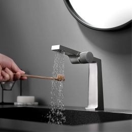 Light luxury brushed gold brass bathroom faucet creative knob switch design single handle cold and hot dual control basin faucet