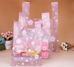 100pcs High Quality Vest Bags Shopping Hand Bag Packaging With Lovely Pink and White Sakura For Sushi Snacks Cakes Baked Goods7363271