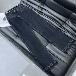 Embroidered denim pants with full upper body tone