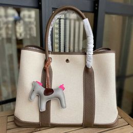 Famous brand bags 2024 Canvas Garden Bag Contrast Shopping Fashion One Shoulder Handheld Large Capacity Fashion designers