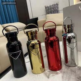 Designer portable vacuum sports water bottle 304 stainless steel insulated cup with handle, classic logo printed car water cup 4 Colours