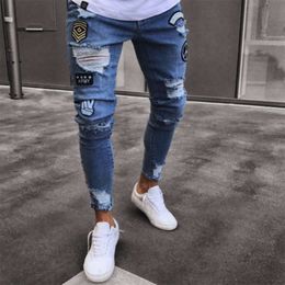 Cross Border European and American Emblem Embroidered Men's Jeans with Knee Tears Zipper Small Feet Pants Foreign Trade Large Size Denim Pants Purple Jeans 989