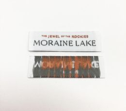 clothe label custom label for cloths 10000pcs Brown black and white ultrasonic cut center fold woven label9996249