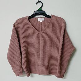 Maglione a maglia con colore solido due risvolti e scarico delle spalle sexy