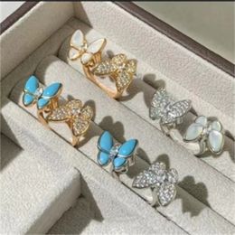 Butterfly ring White Fritillaria double diamond butterfly ring blue turquoise fashion light luxury