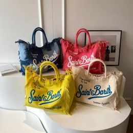 Denim tote bag explosions European and American street canvas letters handmade tassel handbag 240322