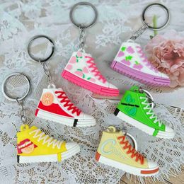 Creative simulation sports shoes keychain PVC soft rubber small shoes three-dimensional doll sneaker pendant small doll gift