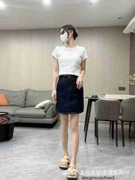 Designer Nanyou SpringSummer New Dark Regular Loe Denim Skirt Women's High Waist Wrap Hip Mini Short Skirt Versatile 45HE