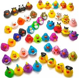 Wholesale-Toilet Supplies Children bathing Toy Floating Rubber Ducks Squeeze Sound cute lovely duck for baby shower 20/36/50/ Random styles LT892