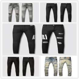 Nowe dżinsy przybysze męskie designer luksusowe dżinsowe spodnie dziury spodnie motocyklowe ubranie męskie Hot Sprzedaj 2024-0889