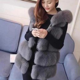 Fur vest female fox fur medium length autumn and winter hooded thickened and warm womens fur vest patchwork jacket 240401