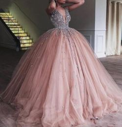 Luxury Champagne Tulle Ball Gown Quinceanera Dress 2019 Elegant Heavy Beaded Crystal Deep V Neck Sweet 16 Dresses Evening Prom Gow9316208