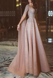 2017 Bling ALine Evening Dresses with Spaghetti Neckline Cape Sash Floor Length Lace Pearls Luxury Nude Prom Gowns2825021