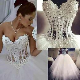 Dresses 2021 amazing Ball Gown Wedding Dresses Sweetheart Corset See Through Floor Length Princess Bridal Gowns Beaded Lace Pearls Custom