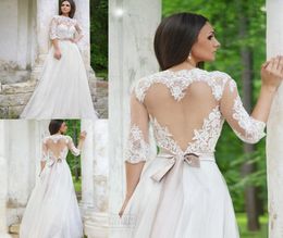 Elegant 2019 Lace Wedding Dresses Half Sleeves Jewel Neck Heartshaped Keyhole Illusion tulle Open Back Wedding Gowns Beach Bridal3418285