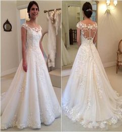 2019 Modest New Lace Appliques Wedding Dresses A line Sheer Bateau Neckline See Through Button Back Bridal Gown Cap Sleeves1805399