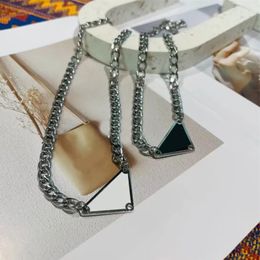 Mens Womens fashion Luxury Designer Necklace Chain Fashion Jewellery Black White P Triangle Pendant Design Silver Hip Hop Punk Titanium stainless steel Cuban chain