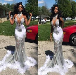 2018 Sexy African See Through Halter Mermaid Prom Dresses Feather Lace Appliques Sleeveless Evening Gowns Plus Size Vestidos De Fe1082959