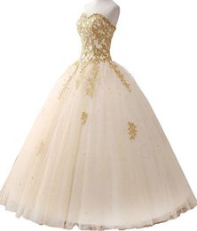 2018 New Gold Appliques Ball Gown Quinceanera Dress Sparkle Crystal Tulle Floorlength Sweet 16 Dress Debutante 15 Year Prom Gowns1479495