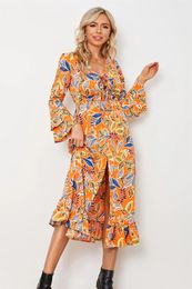 Casual Dresses Women's Resort Style V-neck Bell-sleeved Long-sleeved Elastic Waist Long Slit Floral Dress With Lace-up Design On The Chest