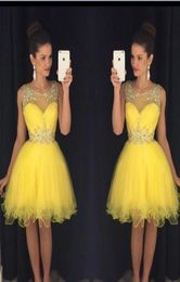 2020 New Short Yellow Homecoming Dresses Illusion Crystal Beads Tulle Sleeveelss Knee Length Party Graduation Formal Plus Size Coc9043614