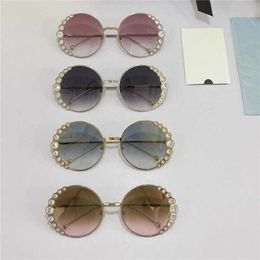 2024 Top designers 10% OFF Luxury Designer New Men's and Women's Sunglasses 20% Off family's fashion diamond rimmed round frame Wu Jinyan's same