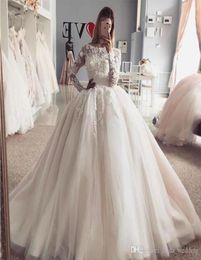 2019 Vintage Arabic Dubai Princess Wedding Dress Puffy Sheer Long Sleeves Lace Appliqued Tulle Bride Bridal Gown Plus Size Custom 8825362