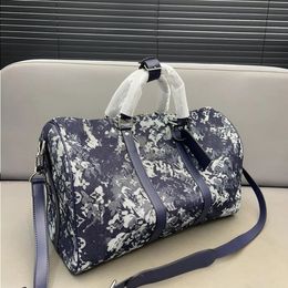 Designer Genuine leather outdoor Travel Bag womens Luxury Brand Unisex Duffel Bags Camouflage Denim Embroidered Letter Evplm