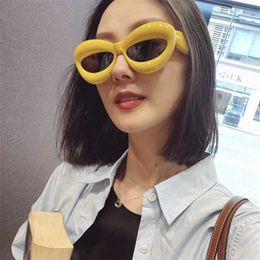 2024 Designer fashion New luxury designer Luoyijia cat's eye sunglasses for women INS The same type of Personalised pout lips Sunglasses LW40097I