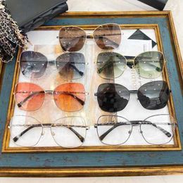 2024 Designer fashion luxury designer sunglasses New Xiangjia Glasses Chain 4274 Women's Metal Calfskin Knitted Mirror Legs Sunglasses UV Protection