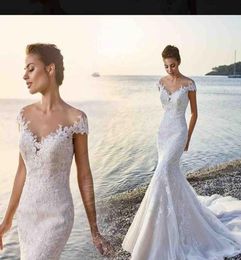 2019 Eddy K Mermaid Wedding Dresses Sheer Jewel Neck Lace Appliqued Sweep Train Beach Wedding Dress Cap Sleeves Custom Boho Bridal8769220