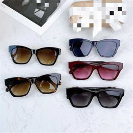 2024 Top designers Men's Luxury Designer Women's Sunglasses cat's eye plate diamond rimmed net red same proof 71438