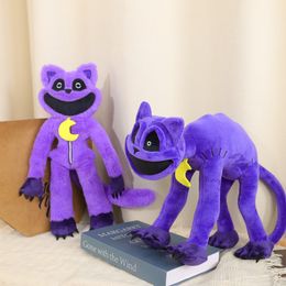 New hot selling smiling critters terrifying purple cat dolls, smiling animals, big mouthed purple cat plush dolls wholesale