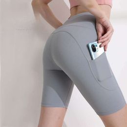 End Lycra Naken Yoga Capris Shorts Kvinnor Cycling Honey Peach High midja Lyft Höft Running Sports Fitness Pants