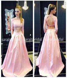 2019 Two Piece Pink Satin Prom Dresses with Bateau Neck Long Sleeve Keyhole Backless Crop Top Marine Ball Pockets Gowns Plus Size 7709954