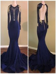 2020 African Navy Blue Mermaid Prom Dresses Sheer Jewel Neck Backless Long Sleeves Beaded Gold Lace Applsique See Though Evening G3126493