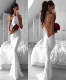 Sexy Backless White Mermaid Prom Dresses Halter Sleeveless 2017 Cheap Long Evening Dresses Fitted Satin Michael Costello Party Dre7208338