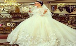 Beaded 3D Floral Applique Ball Gown Wedding Dresses with Long Sleeves Chapel Train Wedding Gown Ivory Lace Tulle Corset Bridal Gow3936878