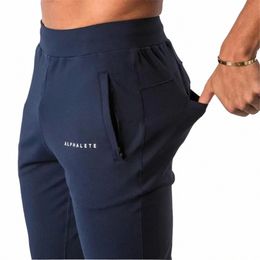 Erkekler Pantolon Stil Erkek Alphalete Marka Jogger Sweetpants Man Spor Salyası Egzersiz Fitn Pamuk Pamuklular Erkek Gündelik Fi Sıska Parça 230131 V9FC#