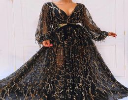 2019 Split Evening Gowns Blingbling Black and Gold V Neck Long Sleeves Sheer Skirt with Golden Metal Belt Sparkly Formal Dresses3054121