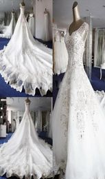 2018 New Designer Top Quality ALine wedding dresses Ball Gown gorgeous and Cap Sleeves With V Neckline Crystals wedding gowns1665117