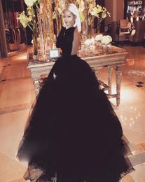 Attractive Open Backless Prom Dress Jewel Neck Long Sleeves Fluffy Floor Length Ball Gown Evening Dress Sexy Black Puffy Tulle Eve3376791