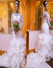 African Long Sleeves Wedding Dress Plus Size Lace Fishtail Sheer Neck Bodycon Fishtail Bridal Gowns Beaded Chic Layer Ruffles robe6380536