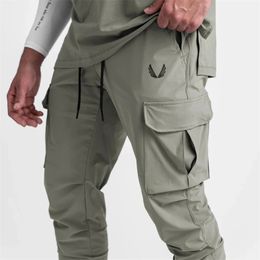 Pocket Mens Cargo Pants Summer Thin Slim Quick-drying Elastic Leggings Running Training Sweatpants Casual Trend Trousers 240402