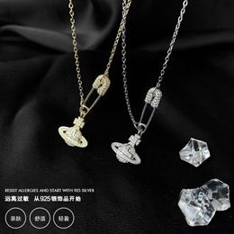 Kaiserin Witwe West Sterling Silber Pin Saturn Halskette Koreanische Schlangenknochenkette Cross Anhänger