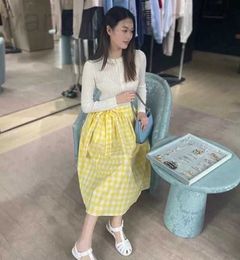 Basic & Casual Dresses designer Shenzhen Nanyou High end MIU Home Spring/Summer Age Reducing Rural Style Side Waist Lace up Design Yellow Grid Pure Cotton Half Skirt 37J