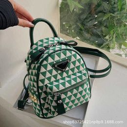 2024 New Designer womens crossbody shoulder Mini Canvas Art Fresh Girl Backpack Versatile Crossbody Fashion Small Bag bag