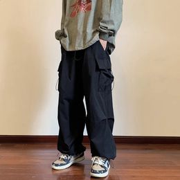 Cargo Pants Men Streetwear Hip Hop Pants Elastic Waist Harem Ankle length Trousers Black Harajuku Casual Pocket Women Pants 240402